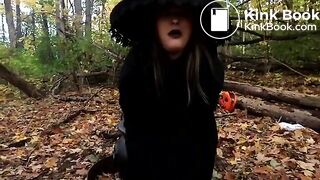 She sits in a cauldron