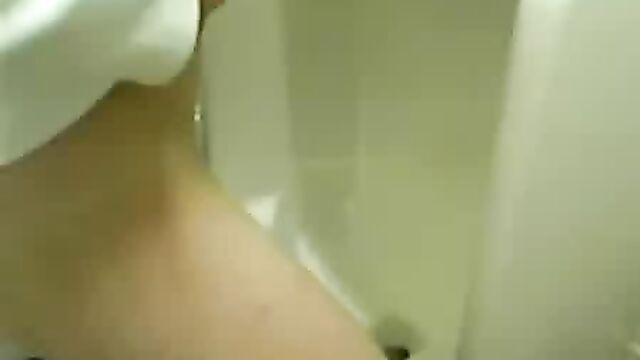 girl peeing in a urinal 16