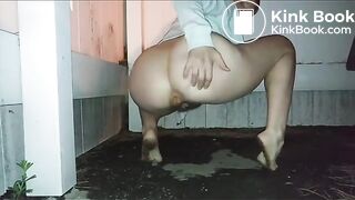 Girl poop near fence