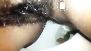 Crazy Latina chick grabs shit log to smear, lick & chew