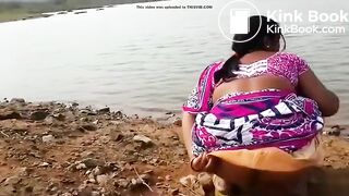 Pissing at the river bank india