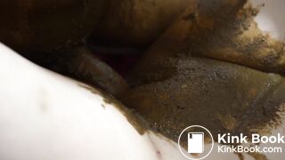 Beautiful lady is playing with poop - video 2