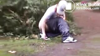 CONSUMING FECES OUTDOORS IN THE PARK