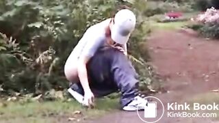 CONSUMING FECES OUTDOORS IN THE PARK