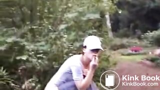 CONSUMING FECES OUTDOORS IN THE PARK