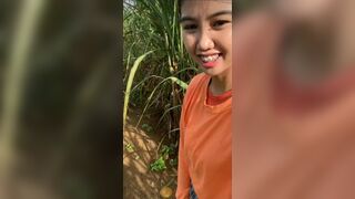 Cute girl shitting in sugarcane field
