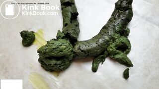 Latina shits out a green snake