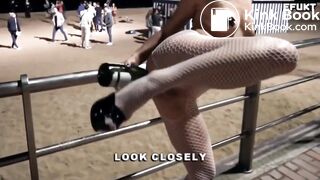 Girl gives herself enema by champagne at the beach