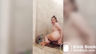 Cutie plays with her shit in the shower
