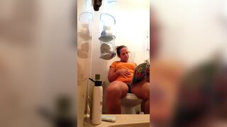 Pooping With Her Feet Up
