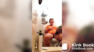 Pooping With Her Feet Up
