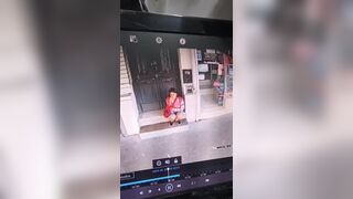 Girl shit in front of a Store