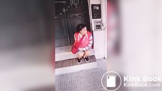 Girl shit in front of a Store