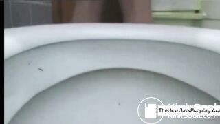 Sexy girl poopin on toilet close-up