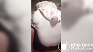 Black girl pushes out a nice mess in diaper