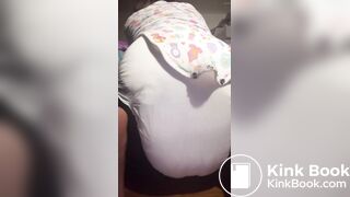 Black girl pushes out a nice mess in diaper