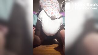 Black girl pushes out a nice mess in diaper