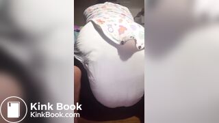 Black girl pushes out a nice mess in diaper