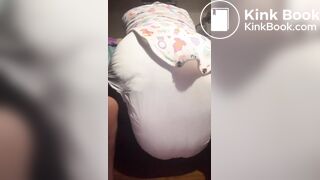 Black girl pushes out a nice mess in diaper