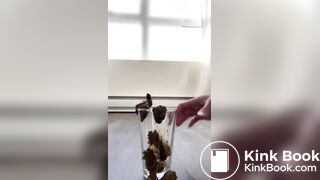 girl poops into a glass