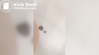 Girl makes mess in bath.