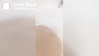 Girl makes mess in bath.