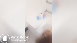 Girl makes mess in bath.