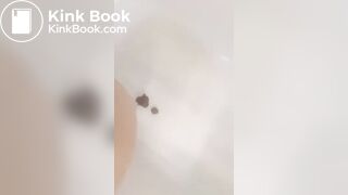 Girl makes mess in bath.