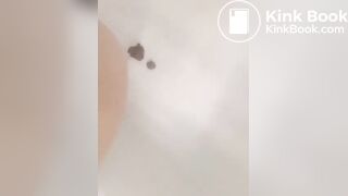 Girl makes mess in bath.
