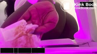 Ebony Woman Shitting in the Toilet