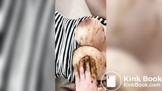 Hot woman stuffing pussy with shitty dildo