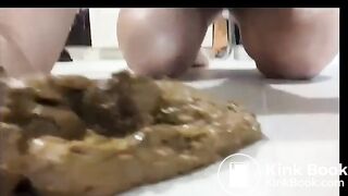 Blonde girl shits in her short