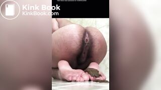 Hairy Ebony babe covers her feet in a puddle of poop