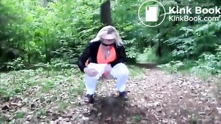 German lady defecates in the woods