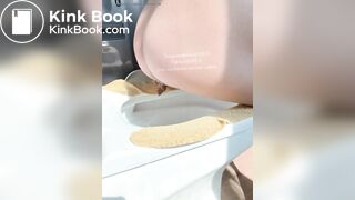 The girl squatted on the toilet to defecate