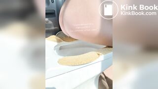 The girl squatted on the toilet to defecate