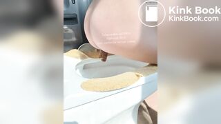 The girl squatted on the toilet to defecate