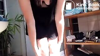 A woman strips and does a standing poop