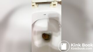 Beautiful girl clogs toilet withbig shit in toilet