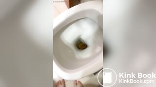 Beautiful girl clogs toilet withbig shit in toilet