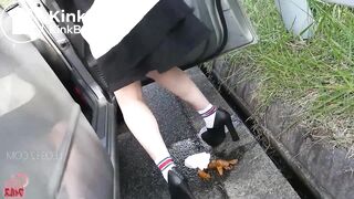 Asian girl squats to relieve herself on a car journey