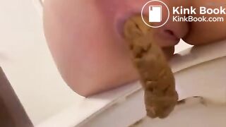 Teen poops a big turd