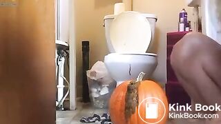Hot girl shitting on pumpkin