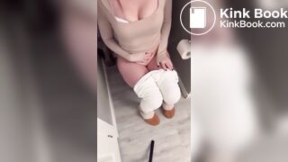 Sexy girl in white leggings having diarrhea on toilet