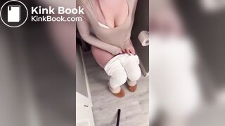 Sexy girl in white leggings having diarrhea on toilet