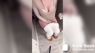 Sexy girl in white leggings having diarrhea on toilet