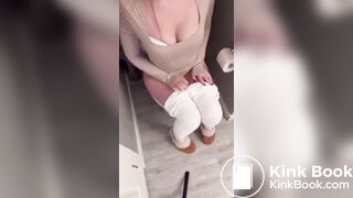 Sexy girl in white leggings having diarrhea on toilet
