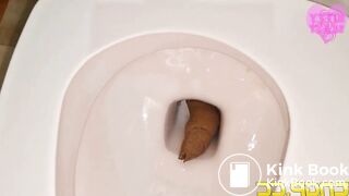 Girl does a massive log that clogs the toilet