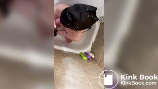 FDG with hood and hands tied blows guy.