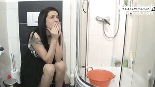 Angie pooping on toilet